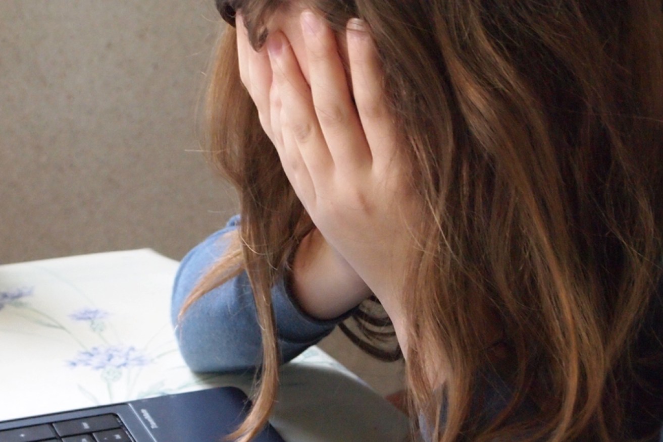 A woman, 40, will face court accused of torturing a 10-year-old girl who remains in hospital.