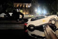 Delivery driver tucks into Maccas after fountain crash