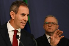 Govt concedes on tax, as doubt surrounds NDIS
