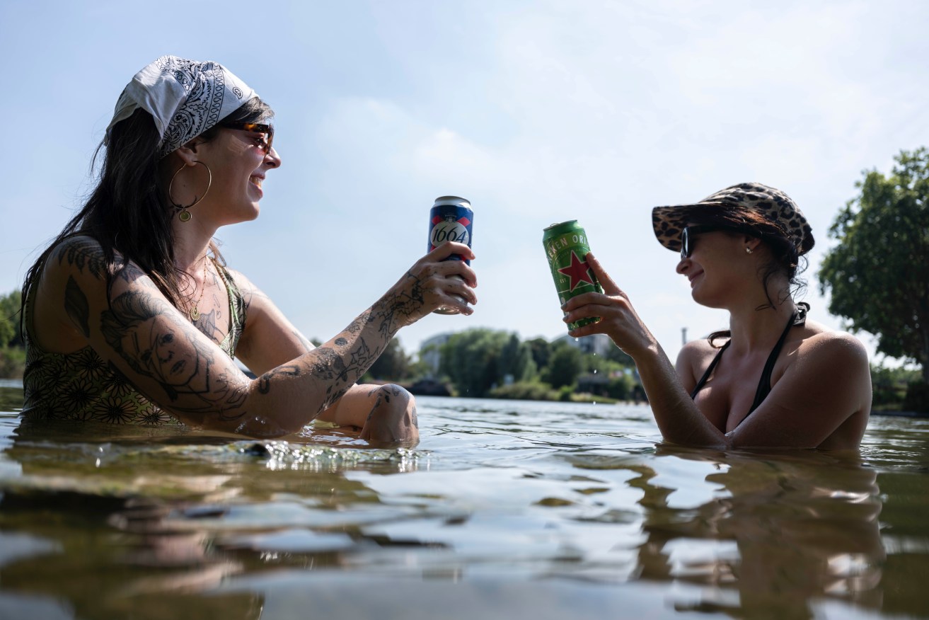 French authorities are warning people to be careful when swimming to beat scorching temperatures.