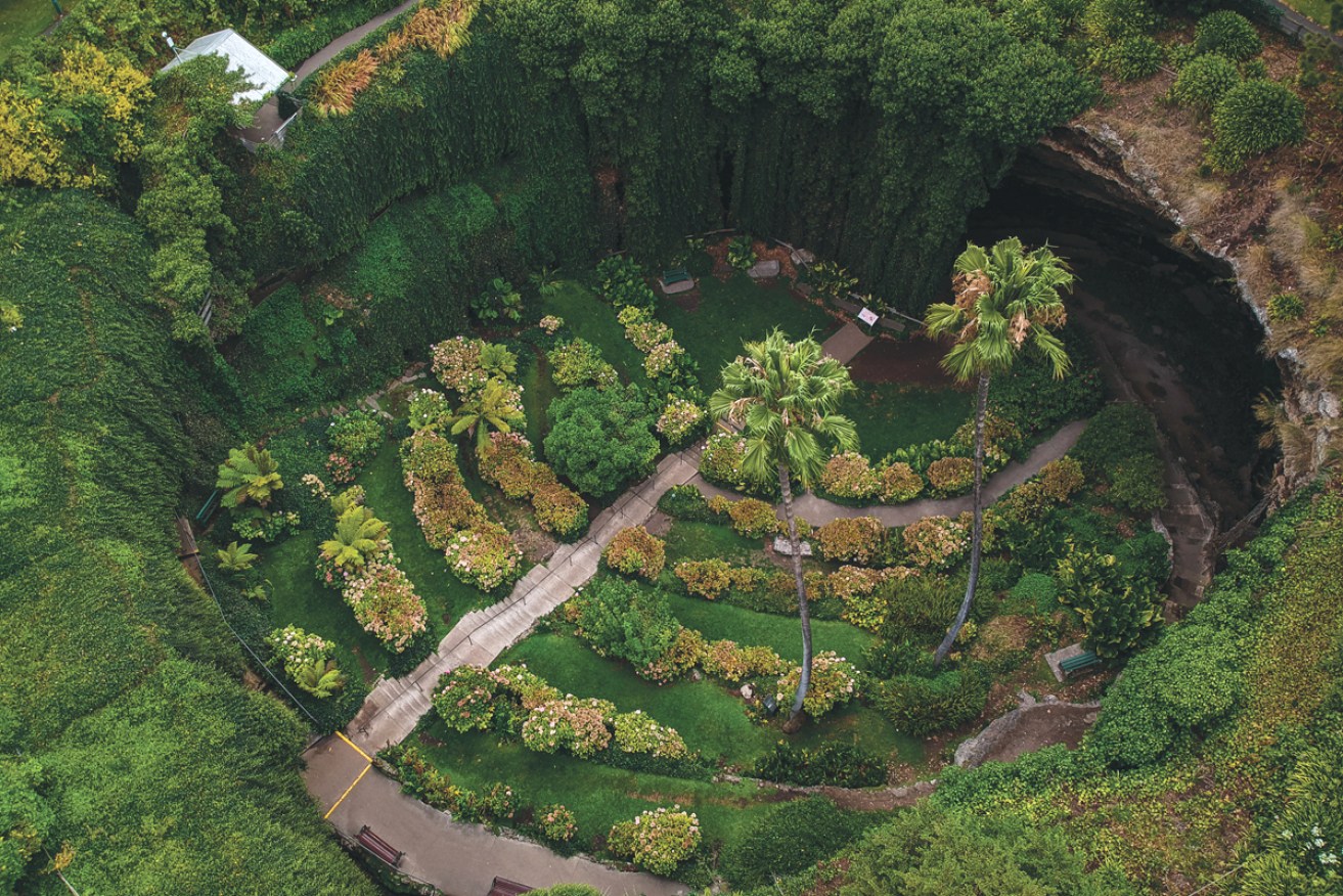 A birds eye view from of the Umpherston Sinkhole in Mount Gambier, South Australia.