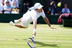 Demon slays Aussie slayer to advance at Wimbledon
