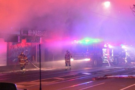 Multiple shops alight after car ramming sparks fire