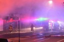 Multiple shops alight after car ramming sparks fire