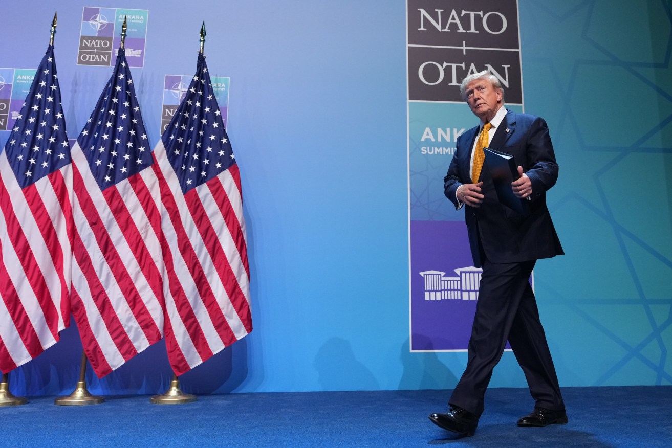US President Donald Trump has spoken of NATO unity after earlier criticising alliance members.