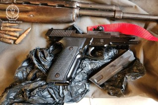 Military-style weapons seized, 11 arrested in raid