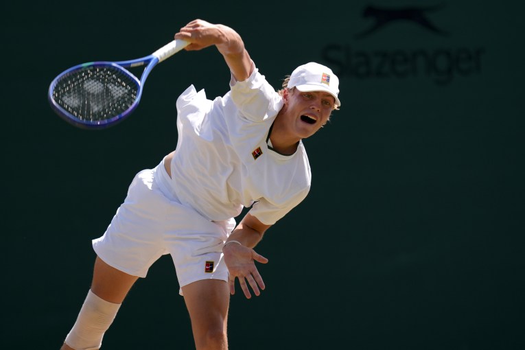 Chip off old block cruises again at Wimbledon