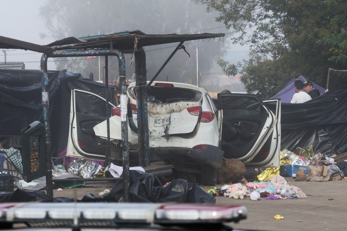 Car ploughs into street market stalls, killing several