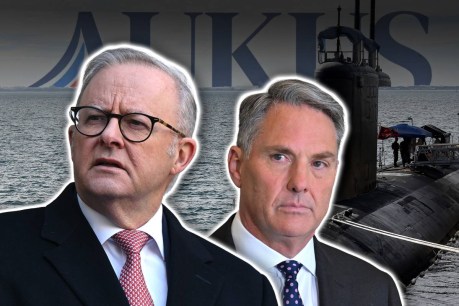 Subs funding boost while lid on AUKUS debate