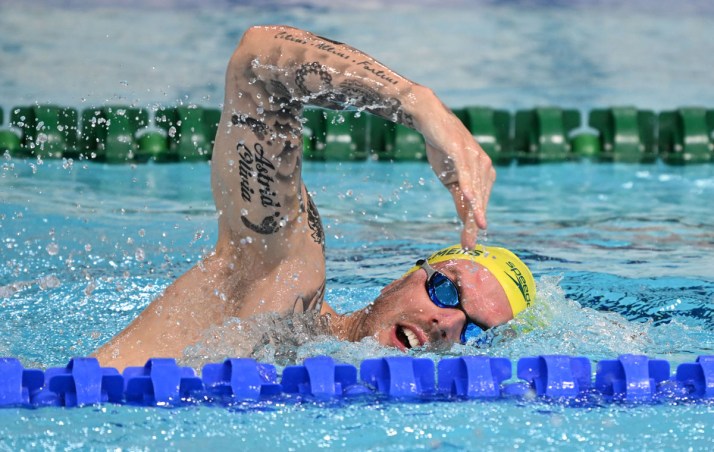 Rinehart's cash bonus as swimmers go for gold