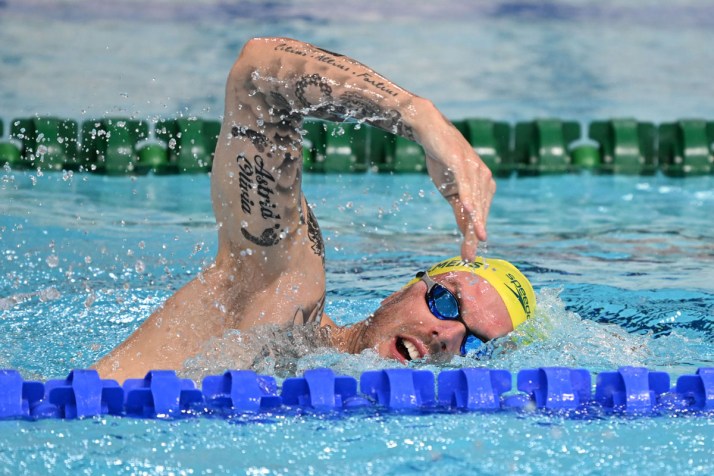 Rinehart's cash bonus as swimmers go for gold