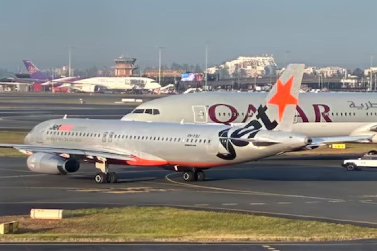 A Jetstar plane has been involved in a near-miss with a Qatar plane on the tarmac at Sydney Airport.