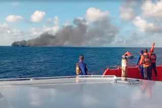 Two Aussies rescued from deadly ferry fire near Bali