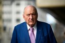 Alan Jones accuser sent lewd text to ‘curry favour’