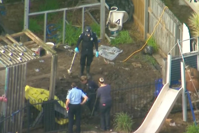 Murder charges after grim find in backyard