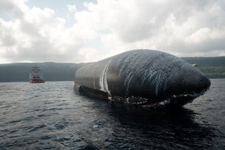 Rocket towed to Christmas Island after splashdown