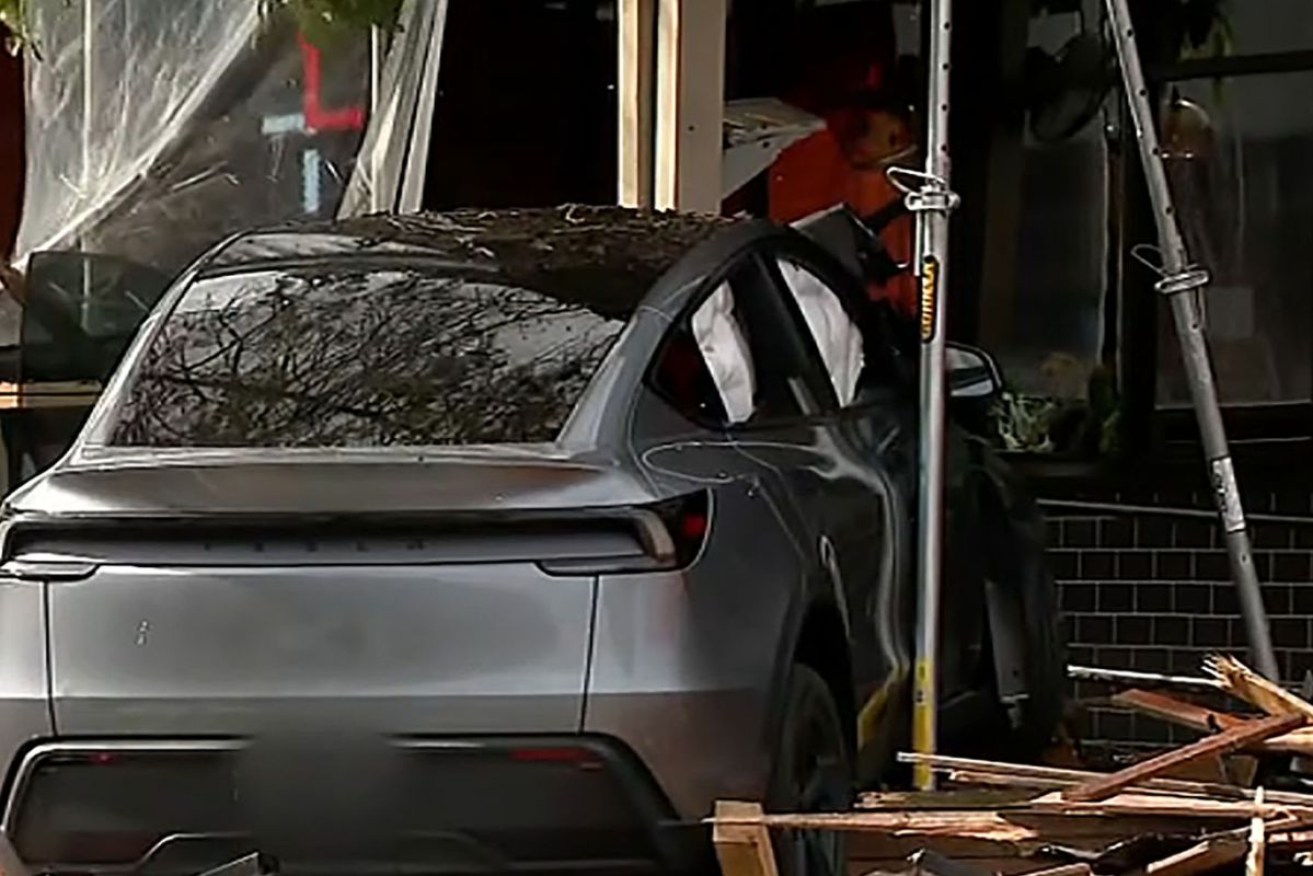 Police are investigating after a car crashed into a Melbourne shopping centre, killing a woman.