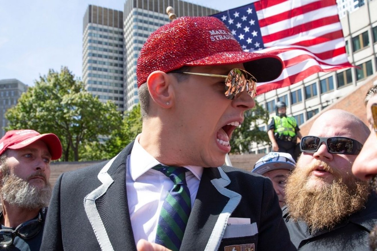 Milo Yiannopoulos takes part in the 'Straight Pride Parade' in Boston in 2019.