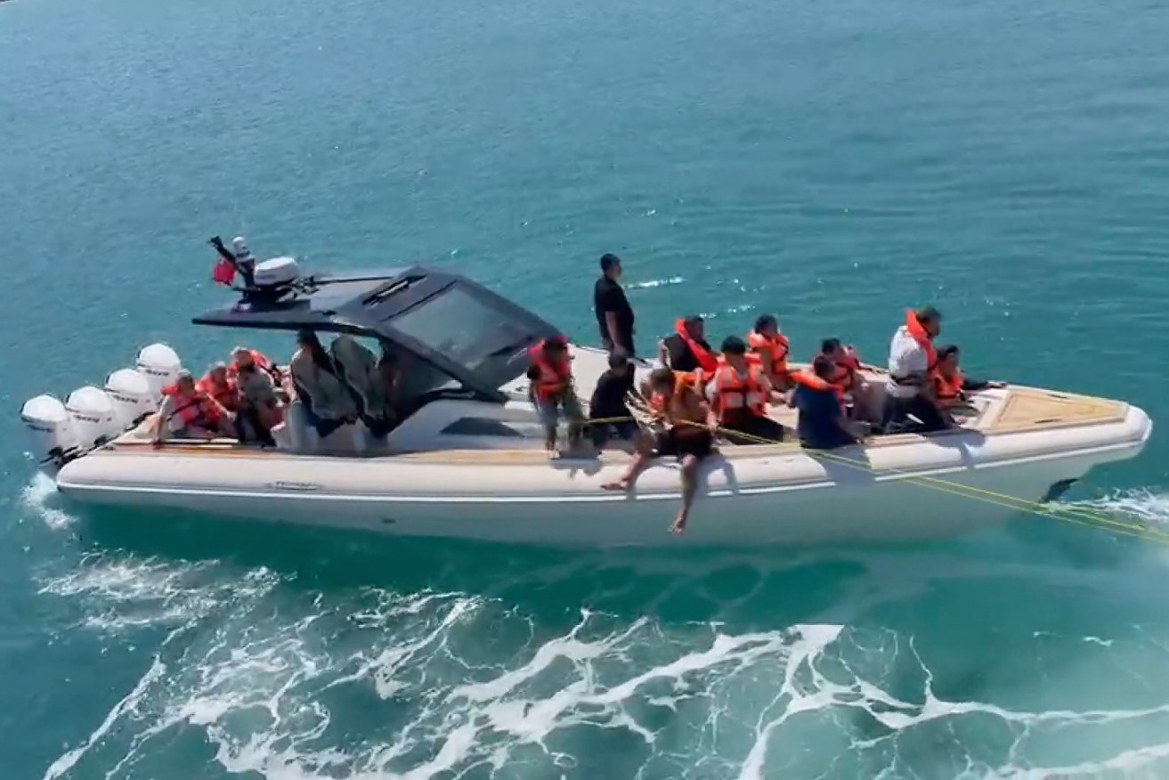 Rescuers scrambled to save passengers from the ferry after it capsized.