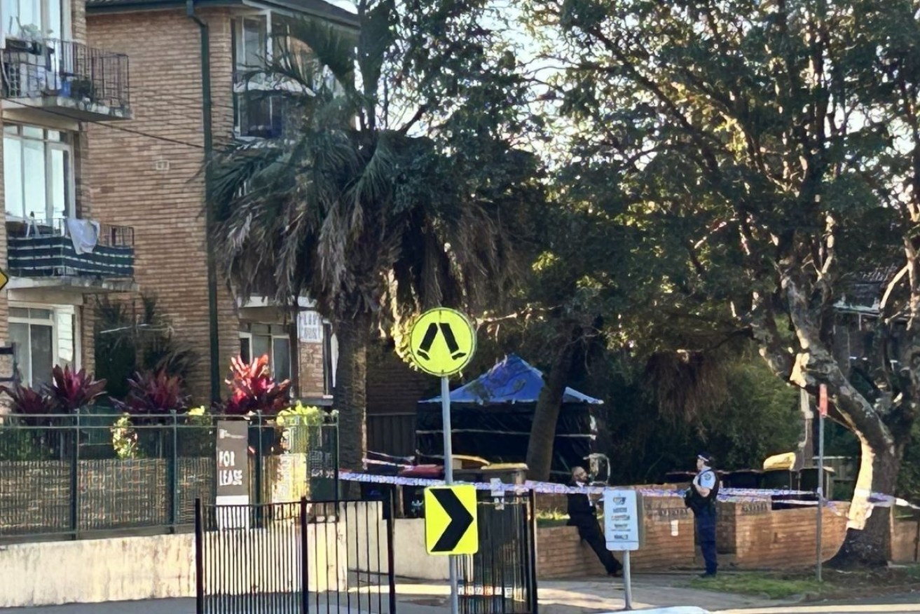A crime scene was set up where a baby was found dead after being left in a bin in Sydney.
