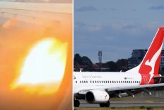 Screaming as Qantas plane diverted with engine flames