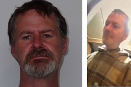 Hunt for axe man after brutal attack on family