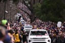 Thousands crowd streets for AFL Grand Final parade