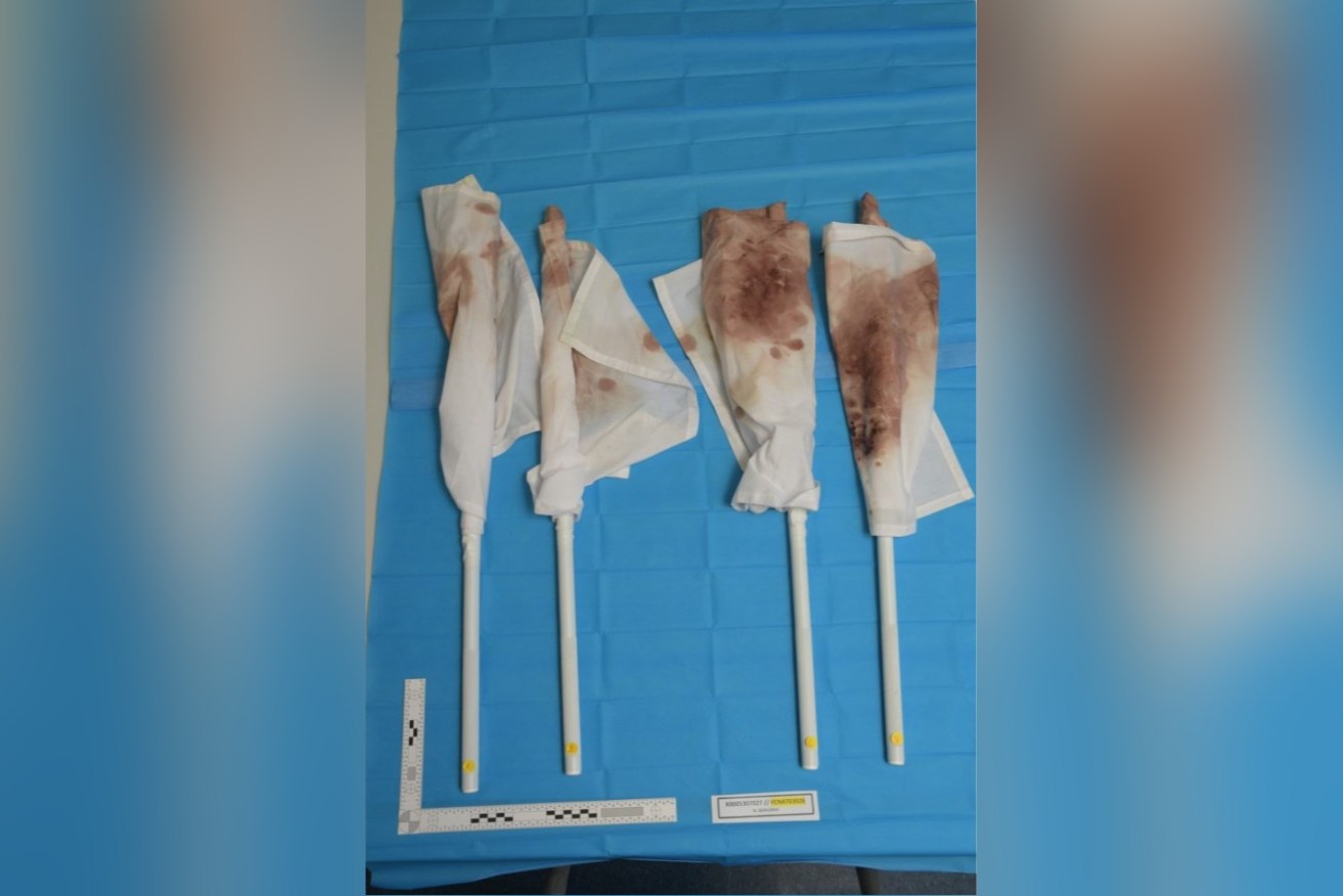 Four bloodstained AFL goal umpire flags were found among Jesse Baird's dumped possessions.