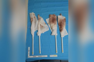 Shoe print, AFL kit show accused cop's kill clean-up