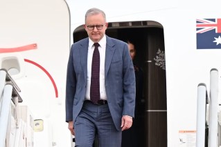 PM leaves grim domestic scene as he flies to Pacific