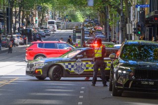 Teen charged after woman struck by car in city centre
