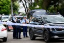 Suburb in lockdown as police hunt armed man
