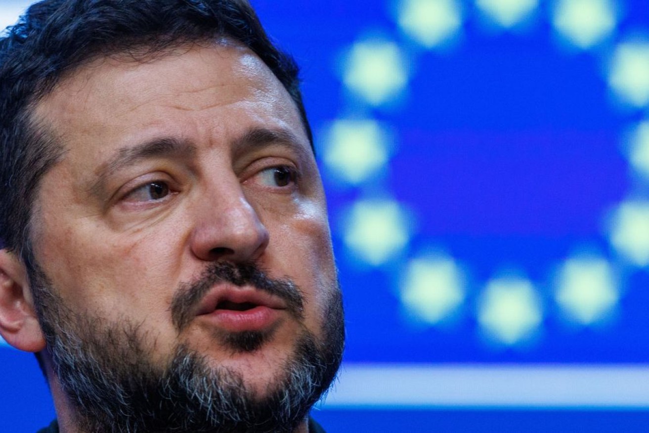 Ukrainian President Volodymyr Zelensky addresses a press conference on the second day of a two-day European Council summit in Brussels, Belgium.