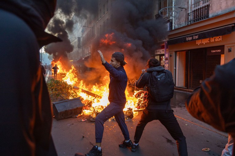 France imposes curfews after violent riots