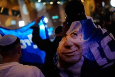 Netanyahu defiant despite major blow in exit polls
