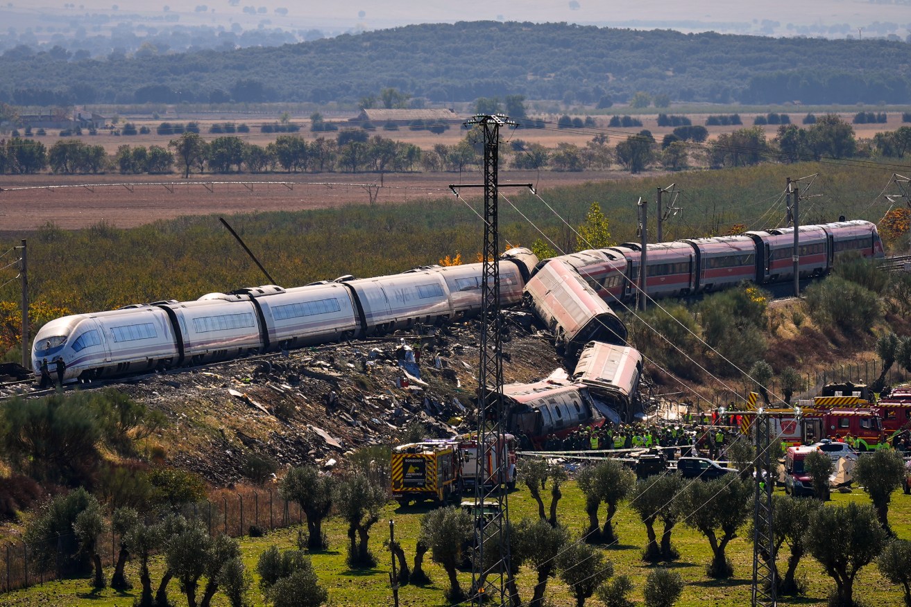 Several carriages of a train have derailed following a deadly collision in central Spain.